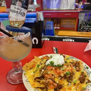 Coronita and shredded beef nachos