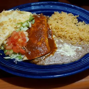 a plate of food with rice and beans