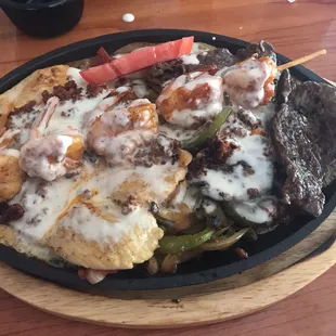 Chicken, steak, shrimp, and chorizo fajitas. #46
