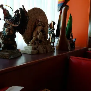 a variety of figurines on a table