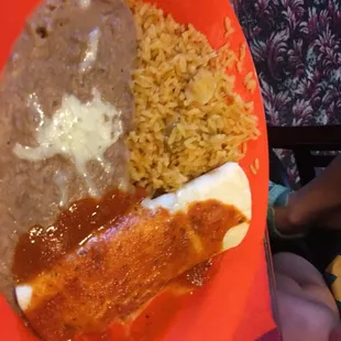 a plate of food with rice and beans