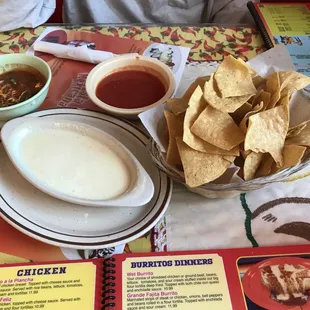 Red salsa - too salty; Spicy salsa - very good; Cheese Dip - very good too.