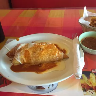 Look at my from to the right, then look at the burrito. It's THAT big.