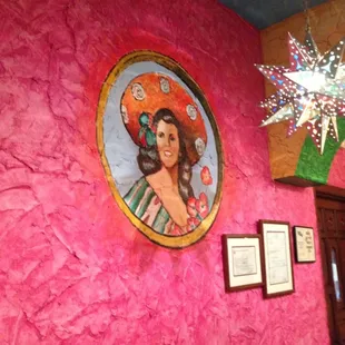 a woman in a pink room