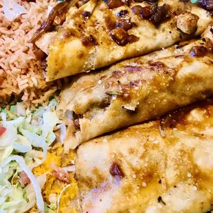 a plate of food with rice and beans