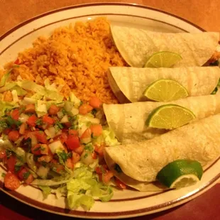 fish tacos on corn tortillas. no crema. simple and yummy.