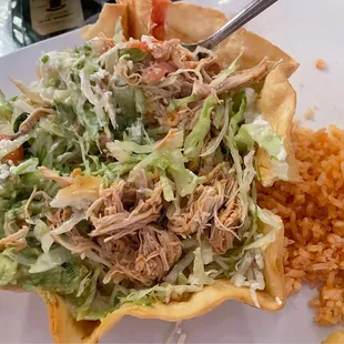 Taco salad with pulled chicken sans beans.  It was filling, tasty, and beautiful.