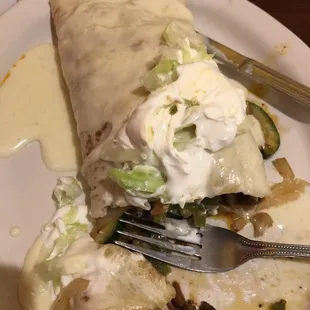 a plate of food with a fork and knife