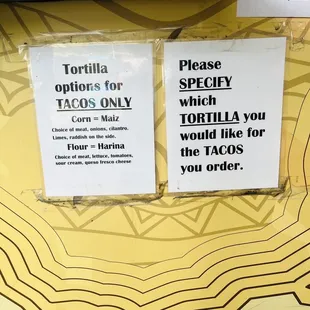 two signs on a table