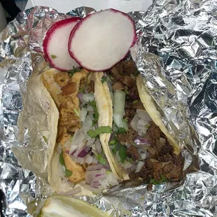 Steak and chicken corn shell tacos