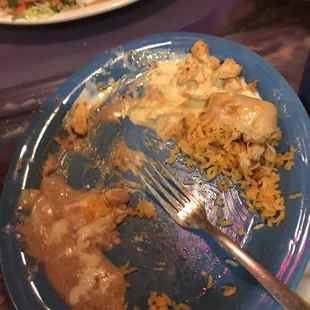 a plate of food with a fork on it