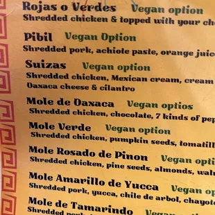 Five different kinds of mole enchiladas.