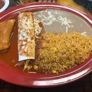 Build your own: pork tamal, chicken burrito, rice and refried beans