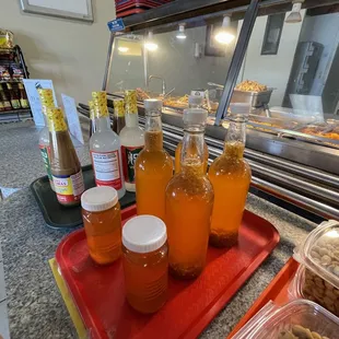 a variety of condiments on a tray