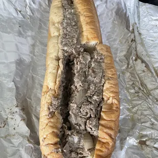 Philly cheesesteak (with provolone cheese and fried onions)