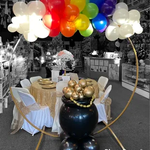 Rainbow balloons with a pot of gold