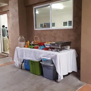 a table with food and condiments