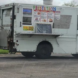 a food truck parked on the side of the road