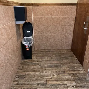 a toilet in a public restroom