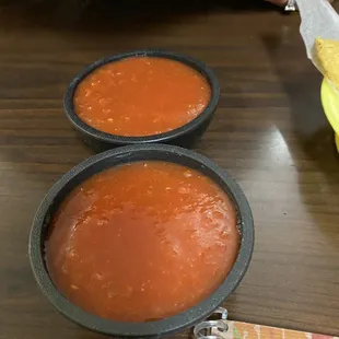 two bowls of salsa