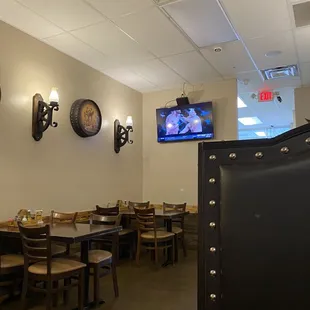 a dining area with a television