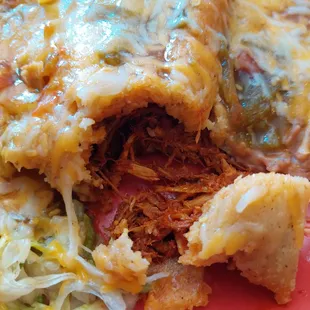 Nice amount of meat in the tamale. However,  the larger chunks of pork just slightly dry. 5-12-23