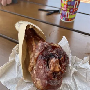 bacon wrapped in a paper bag