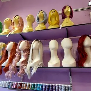 Selection of wigs, one of several walls.