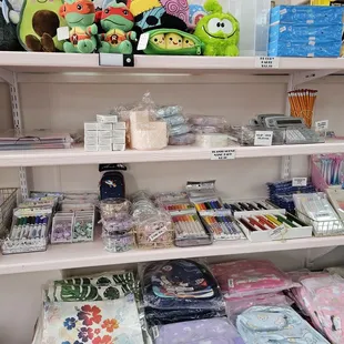 Cute plushies on the top shelf!