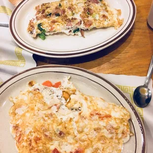 Egg white western in the back and egg white, tomato, turkey, and feta in the front!
