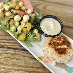 ~Crab Cake Appetizer~ Pure lump crab meat and this bomb salad that comes with.  I&apos;m getting this again when I return!