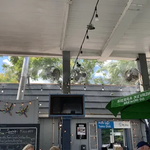 Plenty of misting fans to keep it cool and enjoyable