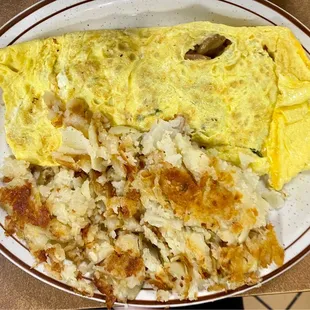 Veggie omelette with home fries