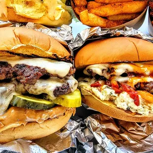 a variety of burgers and french fries