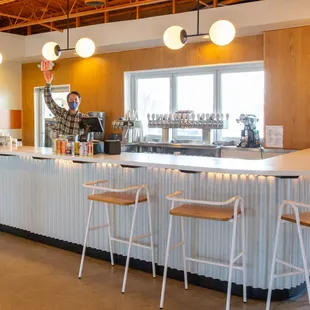 Indoor bar w/ staff happy to see you!