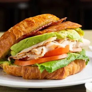 Croissant club with avocado