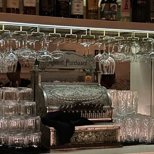 a bar with a lot of glasses