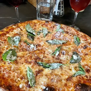 Outta Sight Pizza The Madonna: Marinara, fresh mozzarella, aged mozzarella, extra virgin olive oil, fresh basil, oregano