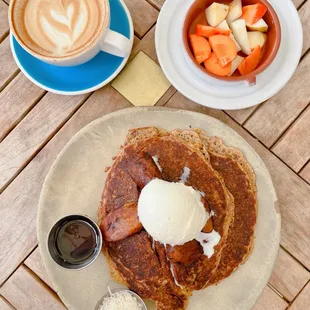 Banana Coconut Pancakes, Latte, and Bowl of Fruits