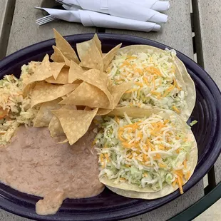 Shrimp tacos. Comes with rice, beans and fresh chips. These tacos are incredible!!