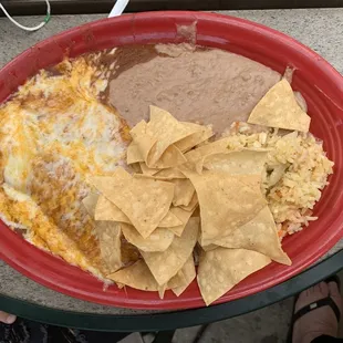 Enchiladas with rice, beans, and fresh chips. So good!