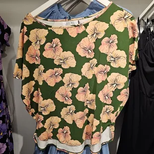 New floral print with a green background