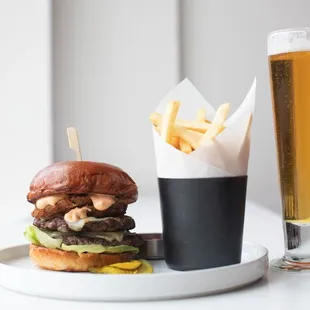 a burger and a glass of beer