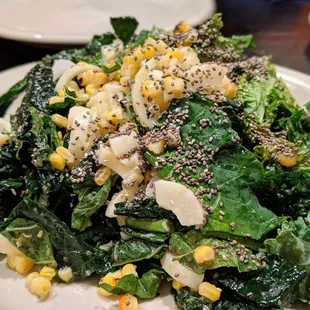 Kale &amp; More Salad. Kale, roasted corn, hearts of palm, pickled Fresno peppers, chia seeds, jalapeno dressing. $7.25.