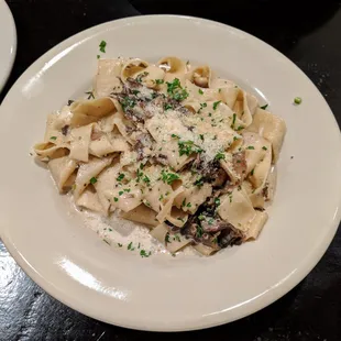 Fettuccine pasta ($4.55) with funghi sauce ($4.85). Wild mushrooms with cream and garlic. Best mushroom pasta I&apos;ve ever had.