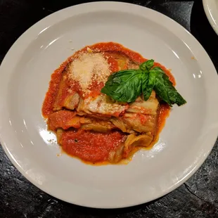 Mamma Edia&apos;s Eggplant. Sliced baked eggplant with classic tomato sauce and Parmigiano Reggiano. $9.85.