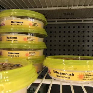 a shelf of hummuss