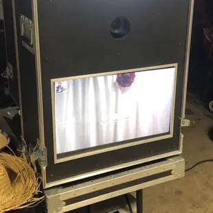 Photo booth with custom designed photo strips.