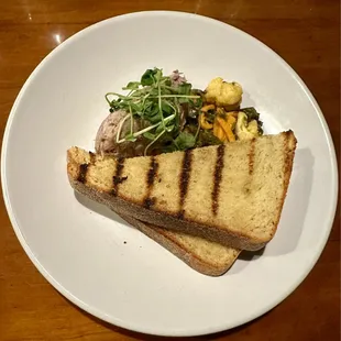 Lamb Rillette served with grilled soda bread.