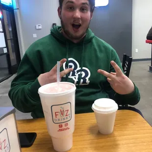 My son enjoying his drink creation